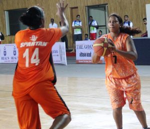 Bharti Netam of SECR about to attempt a jumpshot against Karnataka