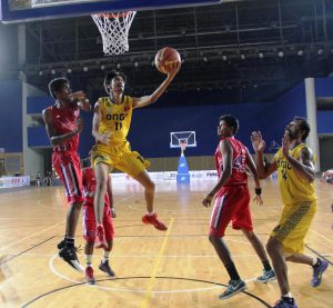 Legs still fresh! Former India international Mohit Bhandari of ONGC in the paint against Vijaya Bank